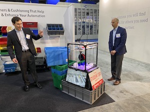 <p>Justin Beckerman, design and solution specialist (left) and Ken Beckerman, product manager, demonstrate Flexcon’s 3D printer for making contained prototypes. </p>

