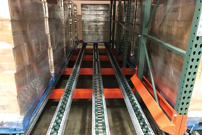 The pallet flow rack system offers space efficient storage for GLK Foods, while also simplifying FIFO inventory management. 