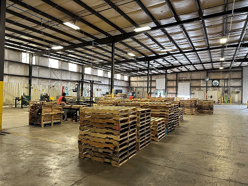 A pallet building area at the new facility.