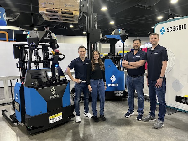 The Seegrid Palion Lift RS1 and Seegrid Palion Lift CR1 with (from left): Dominic Massimiani, strategic account executive; Rachel Pesick, application engineer; Troy Holiman, strategic account executive; and Matt Hoge, senior application engineer.



