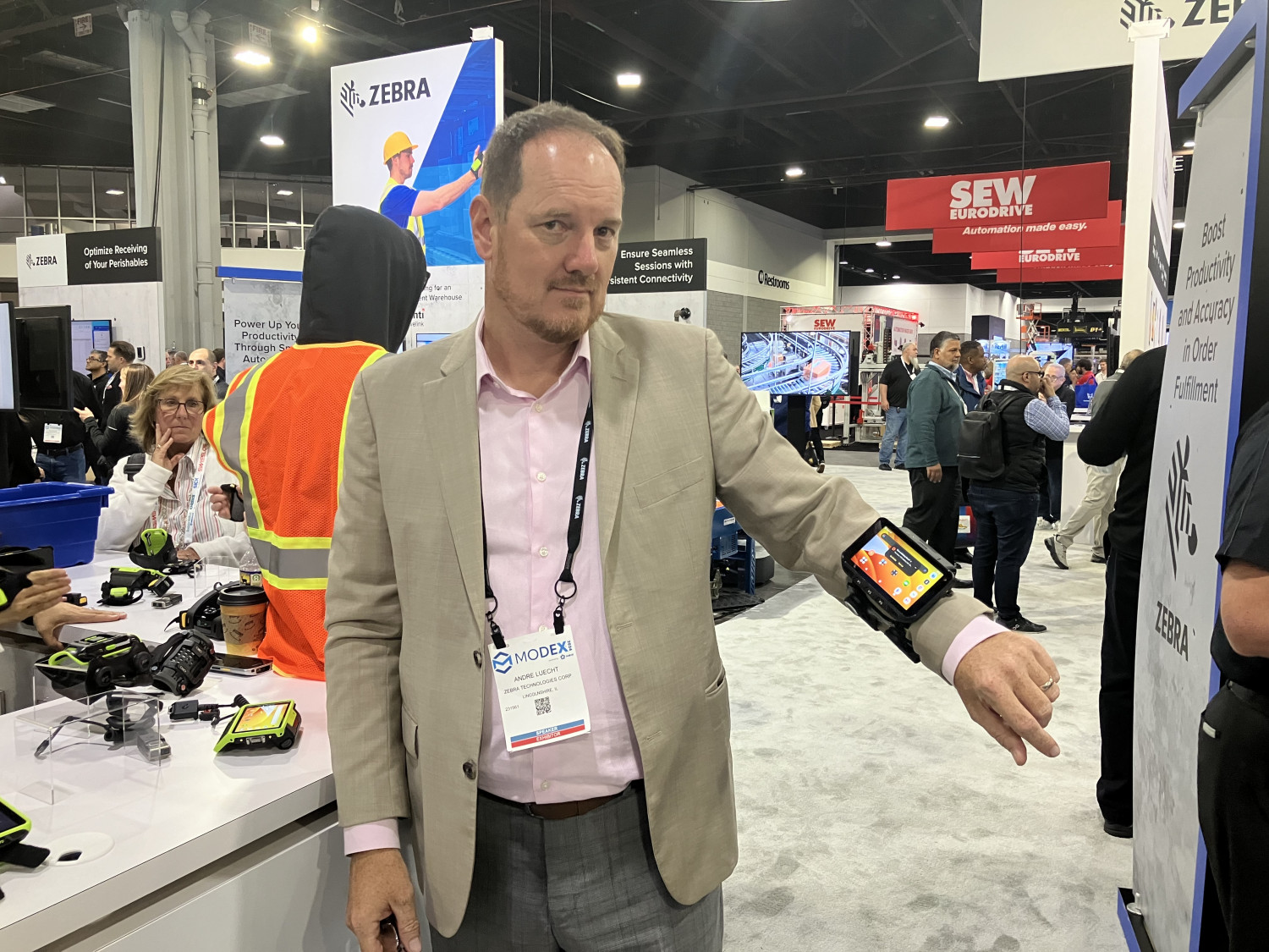 Andre Luecht, Zebra Technologies' global strategy lead, Transportation, Logistics and Warehousing, showcases the company's WT5400 wearable computer.
