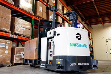 A Phantom Auto remotely operated forklift in action in a DC.