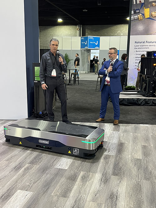 Henny Bouwmeester, VP and GM, Oceanering (left) and Nicola Tomatis, CEO, BlueBotics (right) demonstrate the Unimover O 600. 